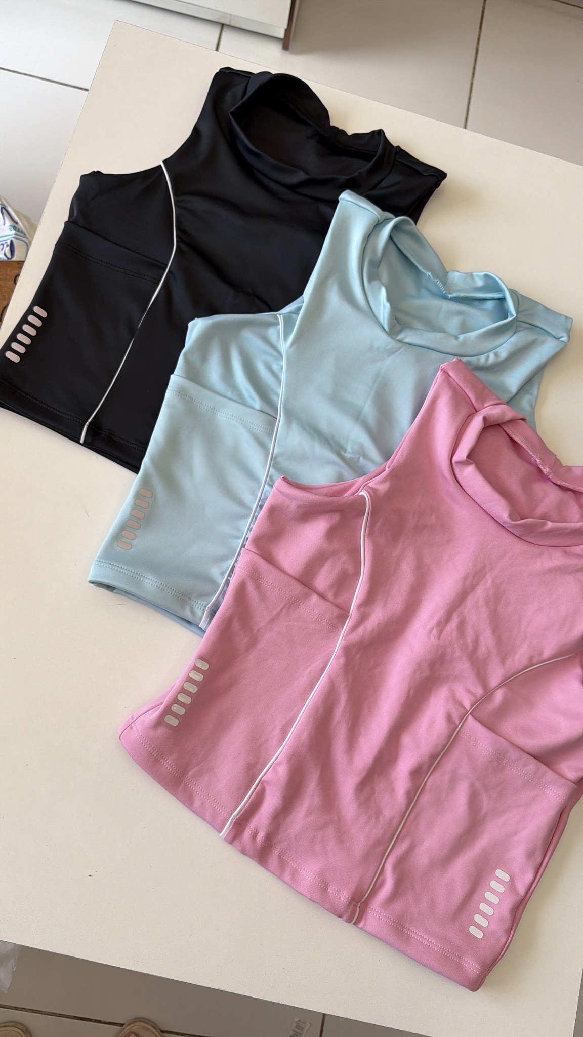 Blusa compressão bolsos refletivos